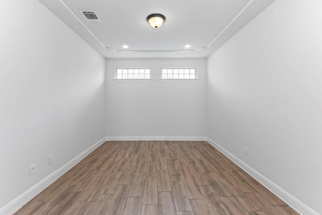4201 Arques Ave, Round Rock, TX 78681 - empty room with wood finished floors, baseboards, and recessed lighting