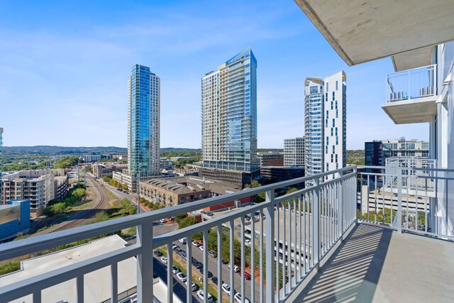 balcony featuring a city view