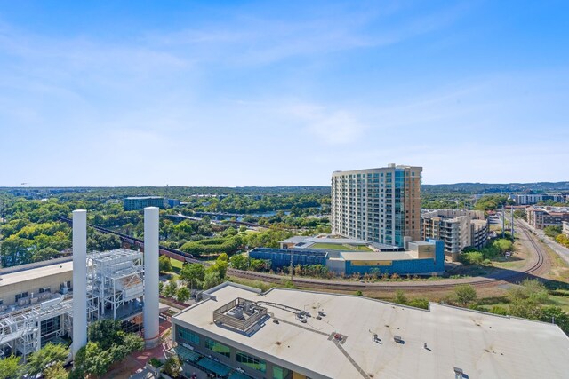 birds eye view of property with a city view