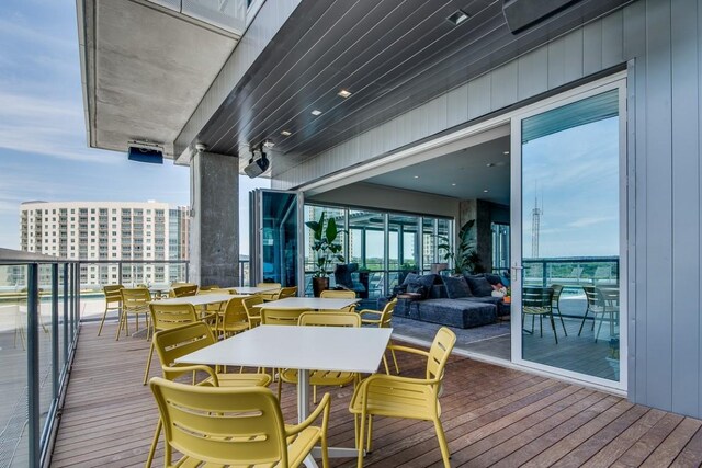 balcony featuring outdoor dining space