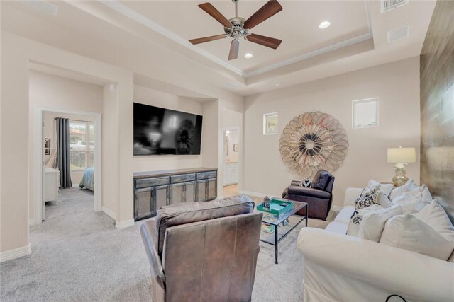 living room with recessed lighting, light carpet, baseboards, and ceiling fan