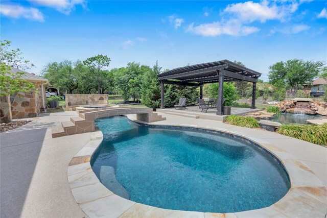 outdoor pool featuring a pergola and a patio area
