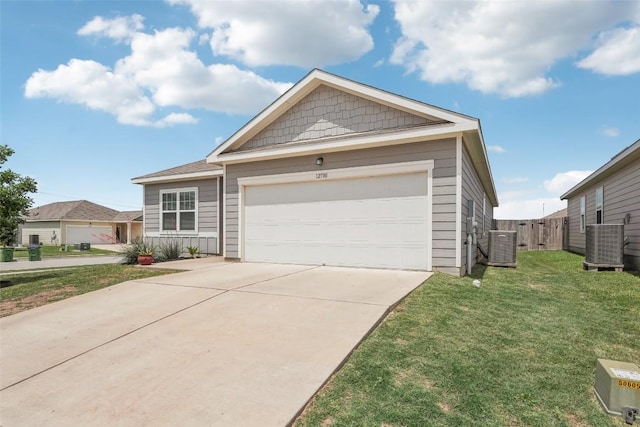 12700 Robert Taft St, Manor, TX 78653 - view of front of property with driveway and a garage