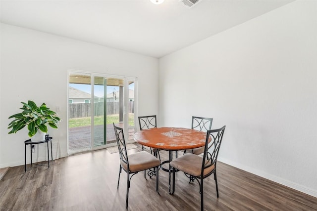 12700 Robert Taft St, Manor, TX 78653 - dining space with wood finished floors and baseboards