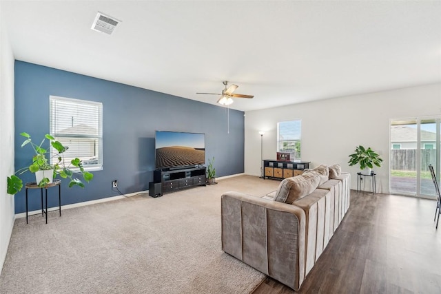 12700 Robert Taft St, Manor, TX 78653 - living area with plenty of natural light, ceiling fan, and carpet floors