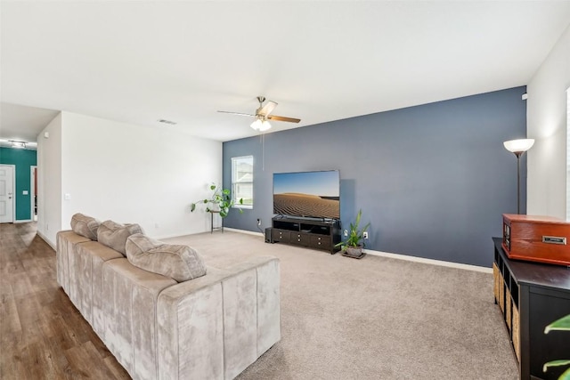 12700 Robert Taft St, Manor, TX 78653 - living area featuring a ceiling fan and baseboards