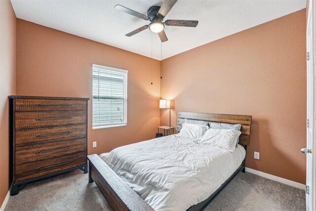 12700 Robert Taft St, Manor, TX 78653 - carpeted bedroom with baseboards and ceiling fan