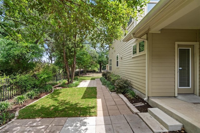view of yard with fence