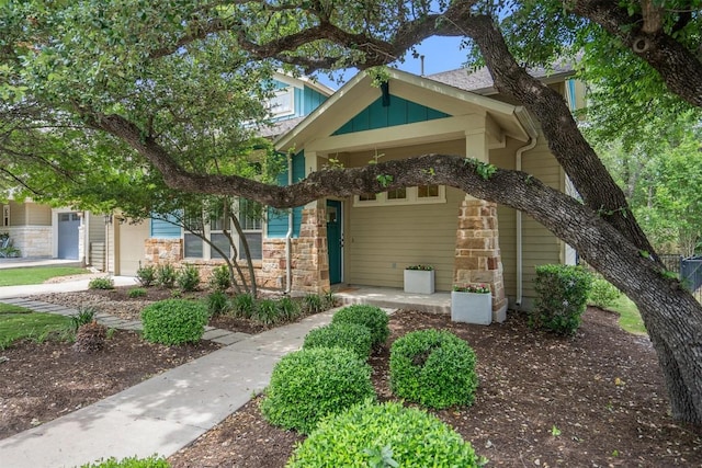 11017 Avery Station Loop Unit 30, Austin, TX 78717 - view of front of home featuring stone siding and board and batten siding