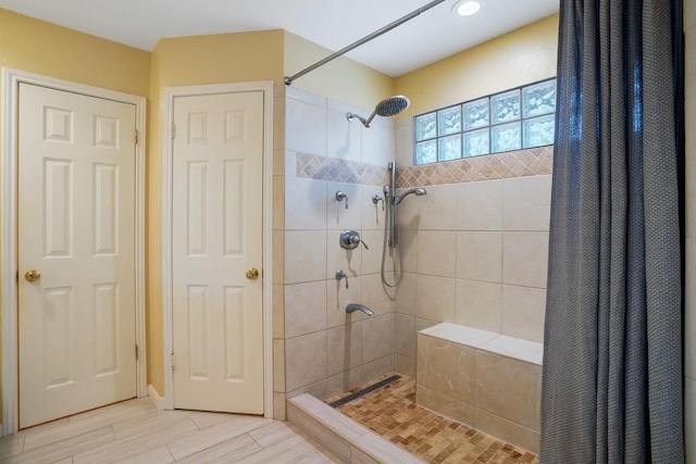 11204 Deadoak Ln, Austin, TX 78759 - full bathroom with tiled shower