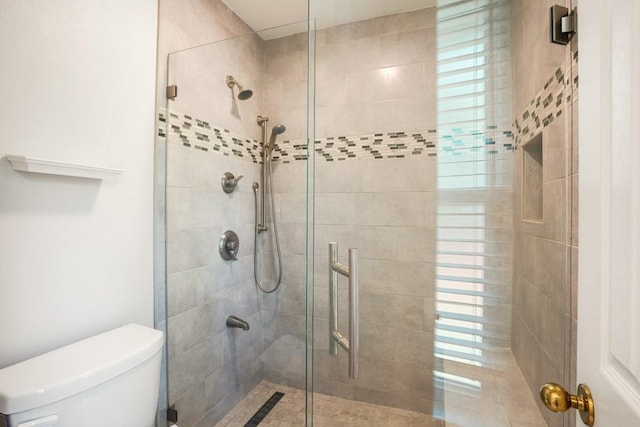 11204 Deadoak Ln, Austin, TX 78759 - bathroom with toilet and a shower stall