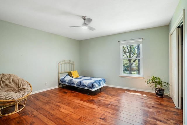 11204 Deadoak Ln, Austin, TX 78759 - bedroom with wood-type flooring, a closet, and ceiling fan
