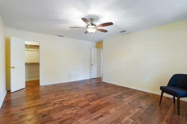 11204 Deadoak Ln, Austin, TX 78759 - unfurnished room with a ceiling fan and wood finished floors