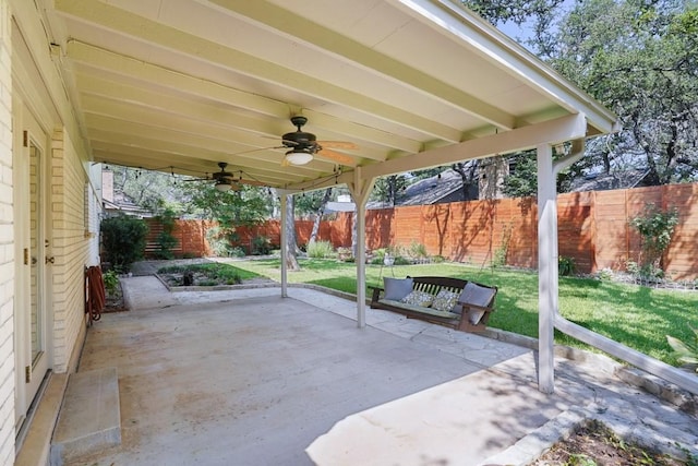 11204 Deadoak Ln, Austin, TX 78759 - fenced backyard featuring ceiling fan and a patio area