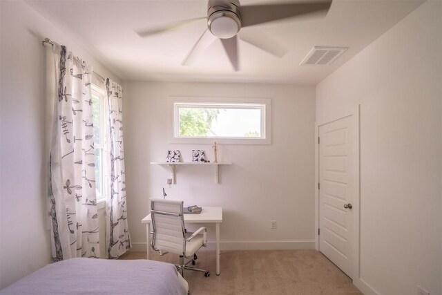 bedroom featuring baseboards, a ceiling fan, visible vents, and carpet floors