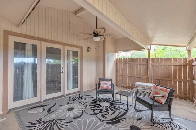 view of patio / terrace featuring ceiling fan, french doors, and fence