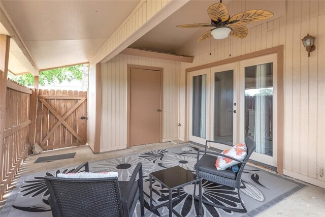view of patio / terrace featuring a gate, ceiling fan, and fence