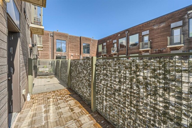 view of patio / terrace with a balcony