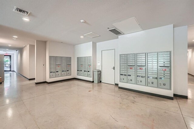 surrounding community with mail area and visible vents