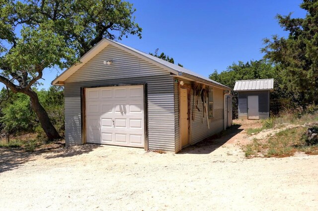 detached garage with driveway