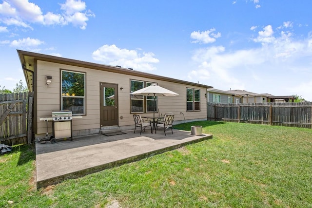 15204 Guffey Dr, Austin, TX 78725 - back of house with a fenced backyard and a patio