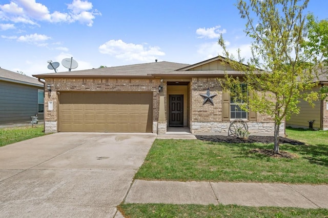 view of front of home featuring a front lawn, driveway, stone siding, an attached garage, and brick siding