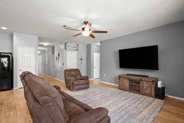 15204 Guffey Dr, Austin, TX 78725 - living area featuring light wood-type flooring and ceiling fan