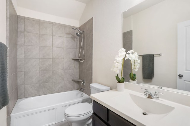 full bathroom with bathtub / shower combination, vanity, and toilet