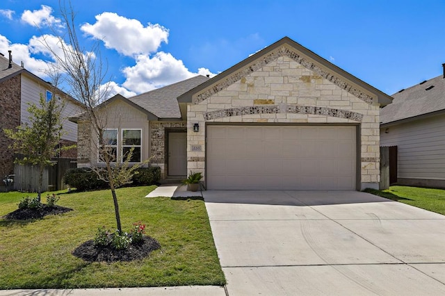single story home featuring driveway, stone siding, an attached garage, fence, and a front yard