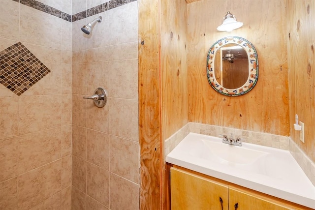 17025 Round Mountain Rd, Leander, TX 78641 - bathroom featuring tiled shower and vanity