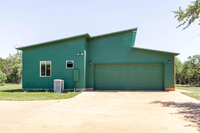 17025 Round Mountain Rd, Leander, TX 78641 - view of property exterior featuring concrete driveway and an attached garage