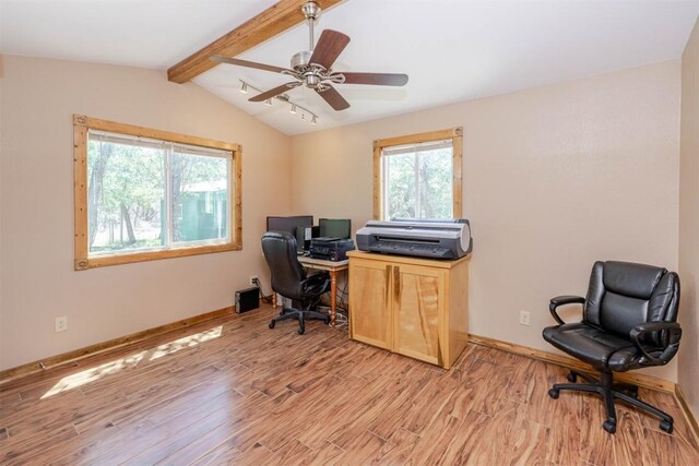office space with lofted ceiling with beams, light wood-style floors, and ceiling fan
