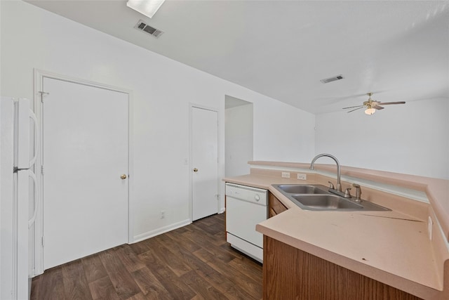 3201 El Salido Pkwy Bldg E, Cedar Park, TX 78613 - kitchen featuring a sink, white appliances, ceiling fan, dark wood-style flooring, and visible vents