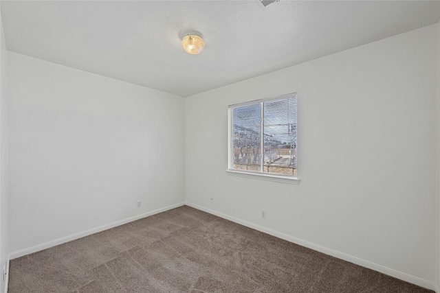 3201 El Salido Pkwy Bldg E, Cedar Park, TX 78613 - spare room featuring dark colored carpet and baseboards