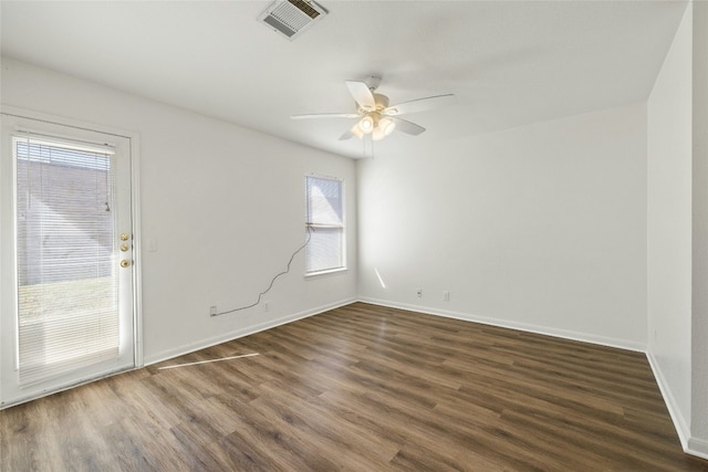 3201 El Salido Pkwy Bldg E, Cedar Park, TX 78613 - unfurnished room with dark wood-style floors, baseboards, ceiling fan, and visible vents