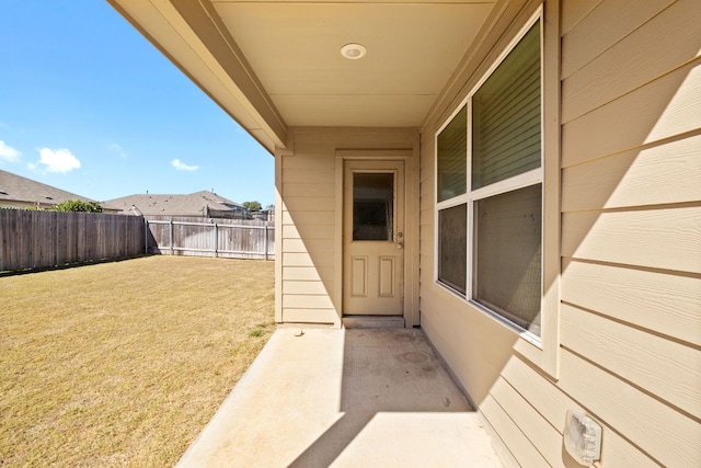 110 Madrid, Kyle, TX 78640 - doorway to property with a patio area