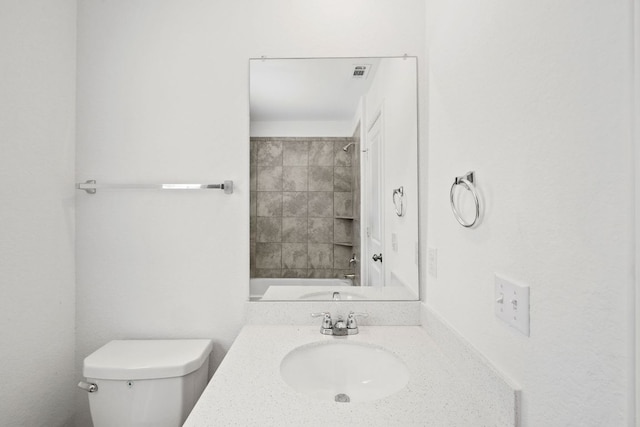 110 Madrid, Kyle, TX 78640 - full bathroom featuring toilet, vanity, and shower / washtub combination