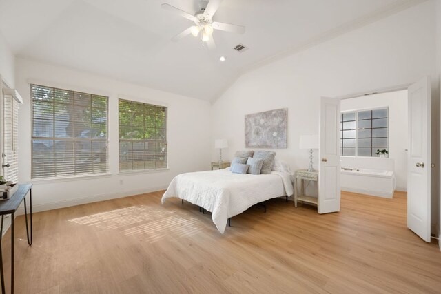 bedroom featuring vaulted ceiling, baseboards, visible vents, light wood-style floors, and ceiling fan