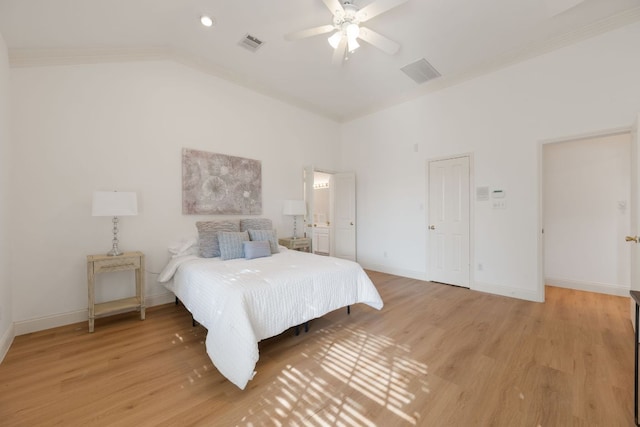bedroom with high vaulted ceiling, ceiling fan, light wood-style flooring, baseboards, and visible vents