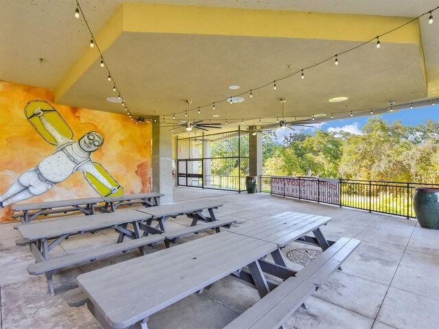 1900 Barton Springs Rd Unit 3007, Austin, TX 78704 - view of patio / terrace featuring outdoor dining space and ceiling fan