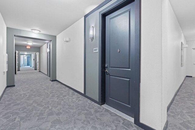 1900 Barton Springs Rd Unit 3007, Austin, TX 78704 - hall featuring carpet and baseboards