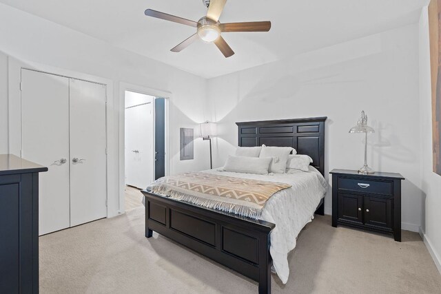 1900 Barton Springs Rd Unit 3007, Austin, TX 78704 - bedroom featuring light colored carpet, a closet, baseboards, and a ceiling fan