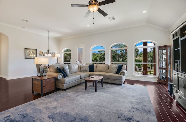 300 Horseback Holw, Austin, TX 78732 - living room with dark wood-type flooring, ceiling fan, a chandelier, arched walkways, and vaulted ceiling