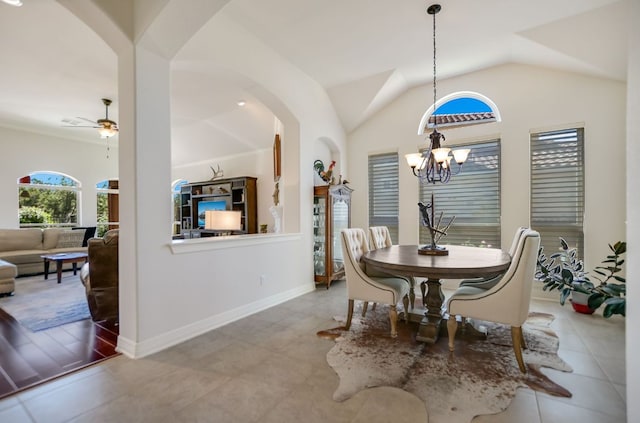 300 Horseback Holw, Austin, TX 78732 - dining area featuring a chandelier, lofted ceiling, ceiling fan, and arched walkways