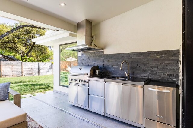 view of patio / terrace with grilling area, a sink, area for grilling, and fence