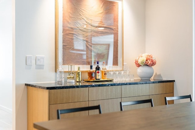 interior space featuring a bar