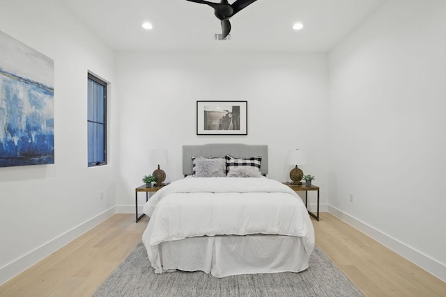 bedroom featuring baseboards, recessed lighting, visible vents, and light wood-style flooring