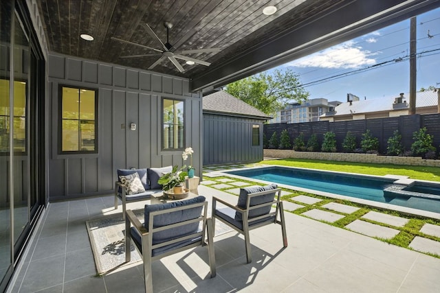 view of patio with a pool with connected hot tub, an outdoor living space, a ceiling fan, and a fenced backyard