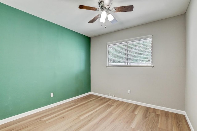6603 Krollton Dr, Austin, TX 78745 - empty room featuring baseboards, wood finished floors, and ceiling fan