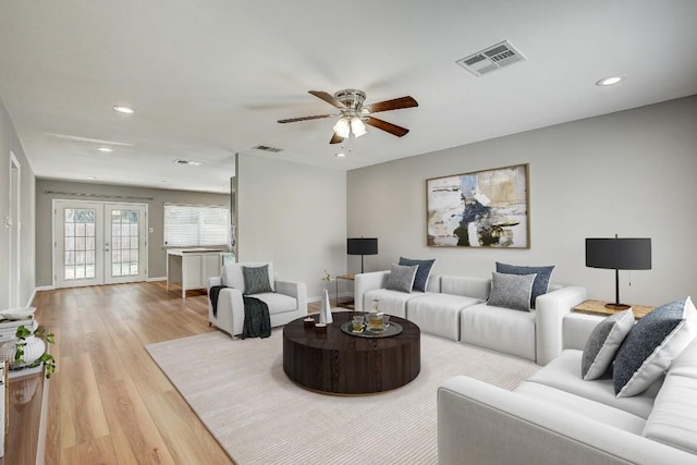 6603 Krollton Dr, Austin, TX 78745 - living room featuring recessed lighting, wood finished floors, ceiling fan, and french doors